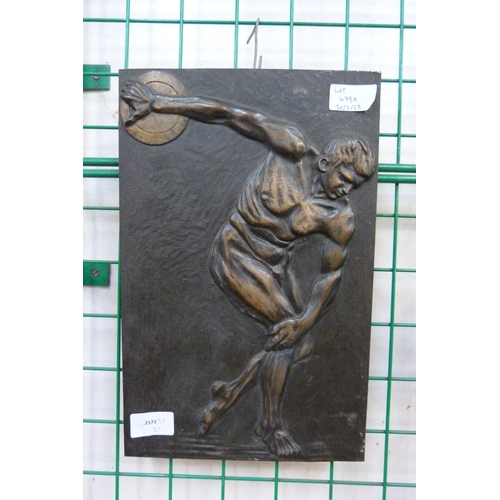 479A - A bronze wall plaque depicting Discobolus