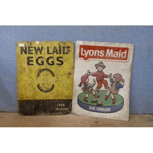 483 - Two vintage metal signs, Lyons Maid and New Laid Eggs