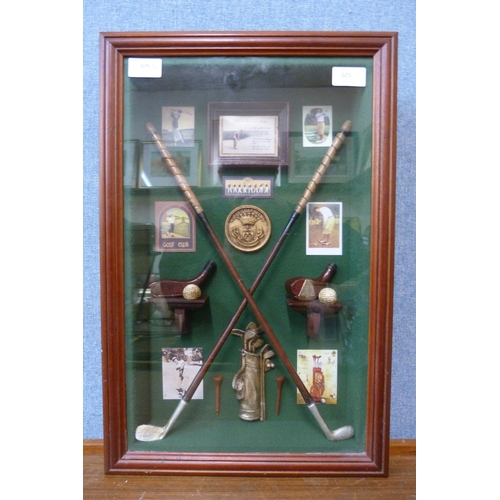 505 - A cased golf memorabilia diorama