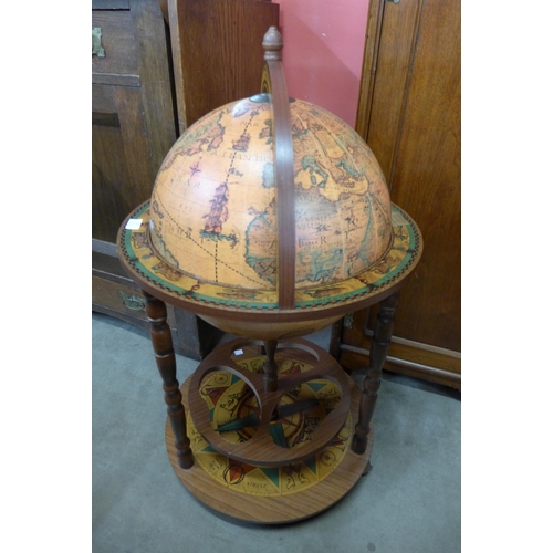 58 - A terrestrial globe cocktail cabinet/trolley