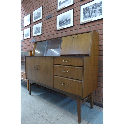 6 - A Nathan tola wood highboard