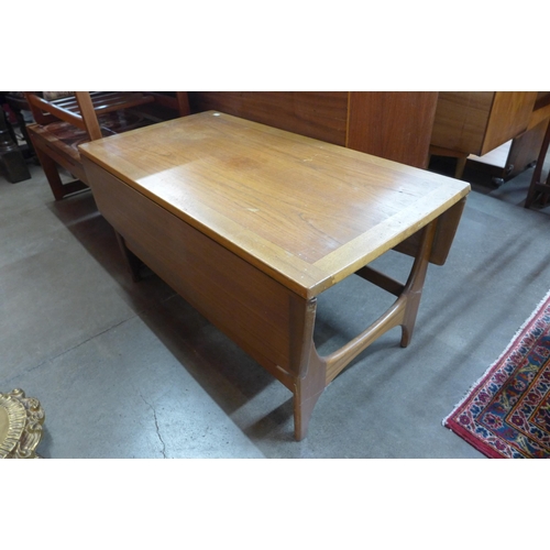 63 - Two teak and tiled top coffee tables and a teak drop leaf coffee table