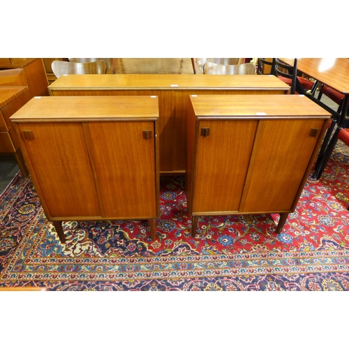 65 - A pair of Beaver & Tapley teak two door bookcases