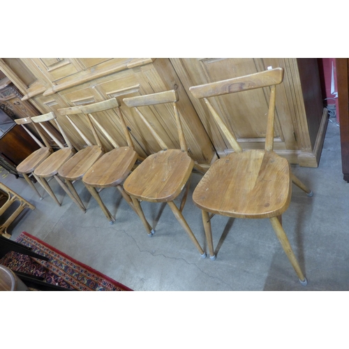 68 - A set of six Ercol Blonde elm and beech 392 adult model stacking chairs