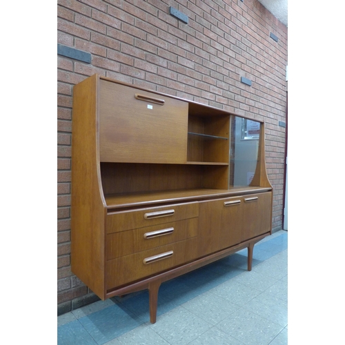 7 - A Jentique teak highboard