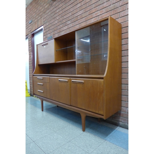 7 - A Jentique teak highboard