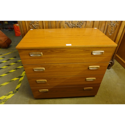 76 - A teak chest of drawers