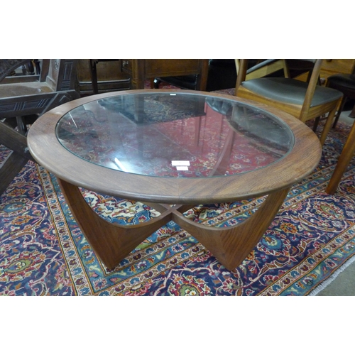 9 - A G-Plan Astro teak and glass topped circular coffee table