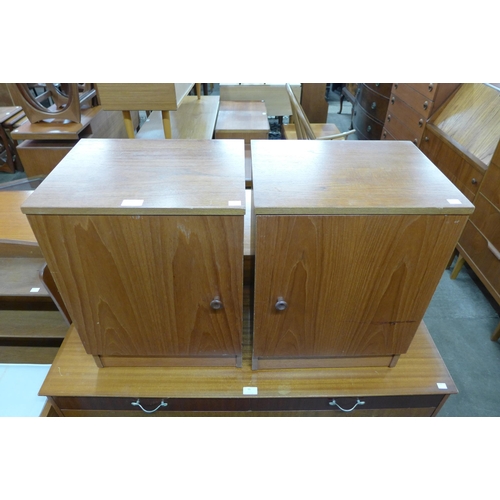 94 - A pair of Austin Suite teak bedside cabinets