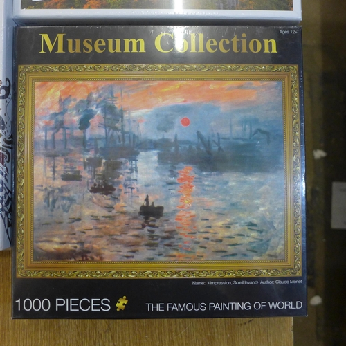 2094 - 3 x 1000 piece jigsaws - Bavarian Castle, Positano scene and Monet's Soleil Levant - sealed