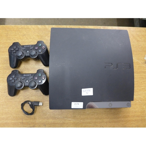 2174 - PS3, two controllers & charger for controllers