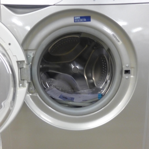 2291 - An Indesit WIDXL1265UK 1200 spin silver washer/dryer  - 2 years old