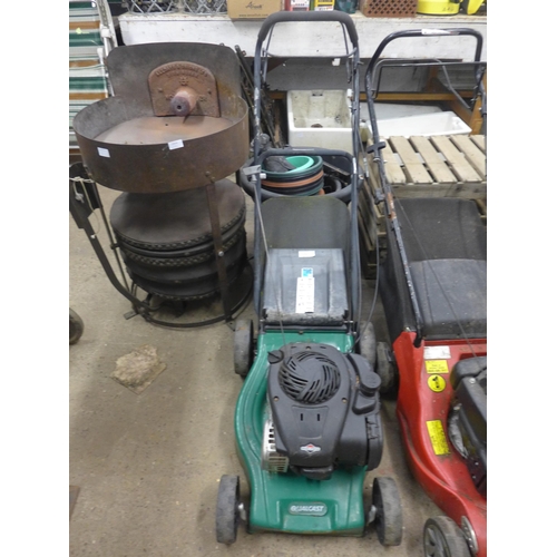 2318 - Four lawn mowers comprising; Qualcast petrol, a Gardenline 575GX and two Mountfield RS100 petrol mow... 