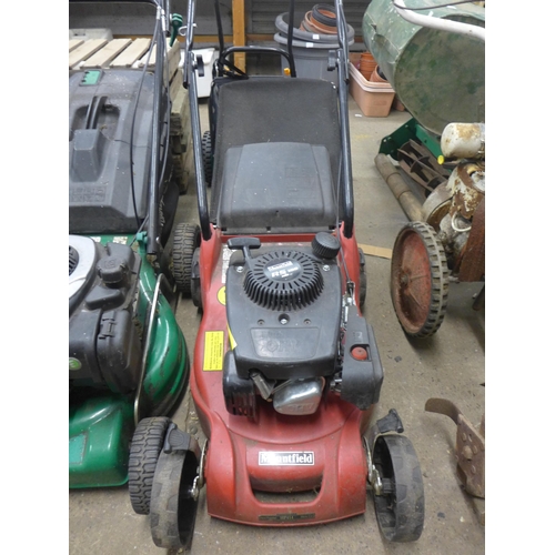 2318 - Four lawn mowers comprising; Qualcast petrol, a Gardenline 575GX and two Mountfield RS100 petrol mow... 