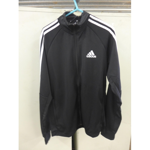 2370 - An Adidas Sereno tracksuit top - Medium size with tags RRP £54.99