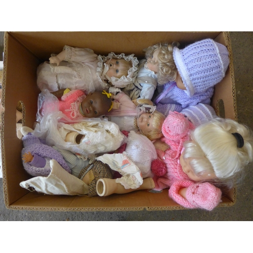 2414 - A box of reproduction antique and vintage-style dolls