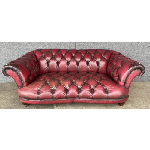 209 - A Tetrad Oska oxblood red leather Chesterfield settee