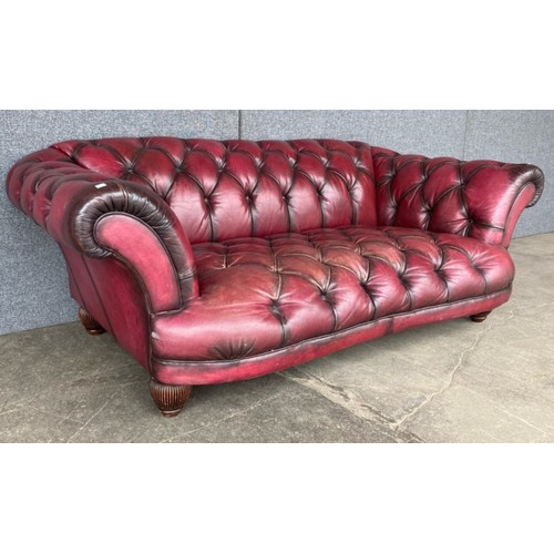 209 - A Tetrad Oska oxblood red leather Chesterfield settee