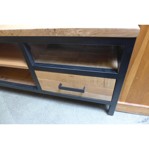 1593 - An oak and steel TV unit * this lot is subject to VAT