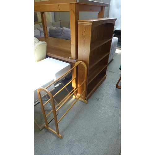 1642 - A pine bookcase and towel rail