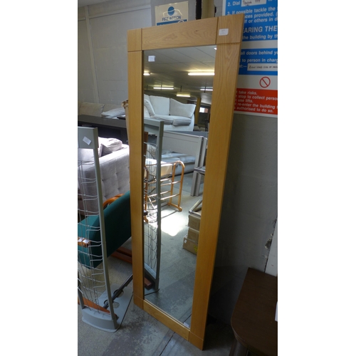 1677 - An oak framed full length mirror