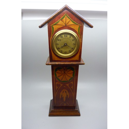 694 - Five clocks including Art Nouveau miniature Grandfather clock, two carriage clocks and a Swiza