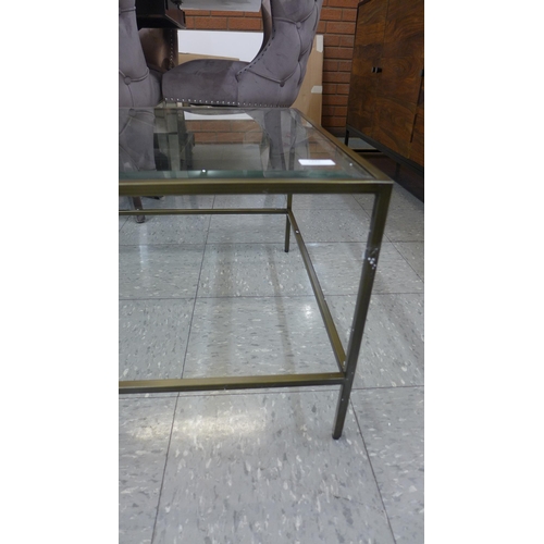 1342 - A gold and glass industrial style coffee table * this lot is subject to VAT