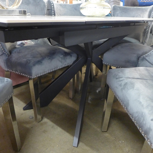 1362 - A Kos marble effect extending dining table with a set of six Marvel grey button back and studded din... 