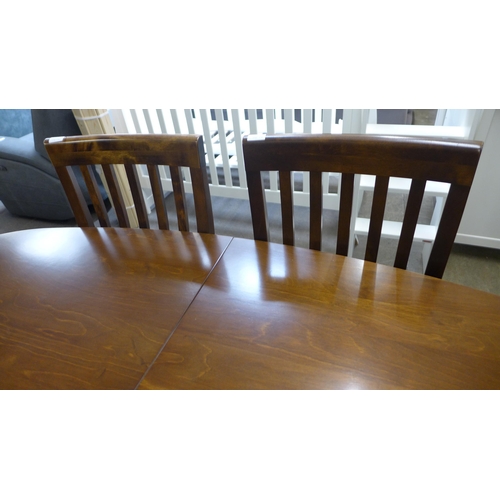 1536 - A Laura Ashley chestnut oval extending dining table and four chairs, 180cm extending to 225cm, width... 