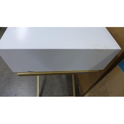 1550 - A white two drawer console table with gold legs - damaged