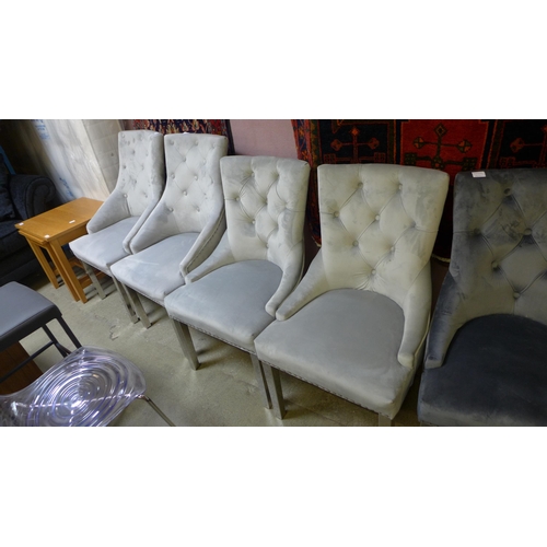 1563 - A set of four grey velvet buttoned dining chairs (two large, two standard)