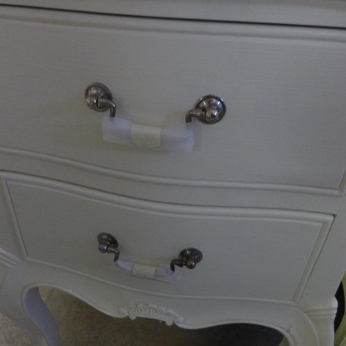 1580 - A pair of cream French style bedside chests - one slightly damaged * this lot is subject to VAT