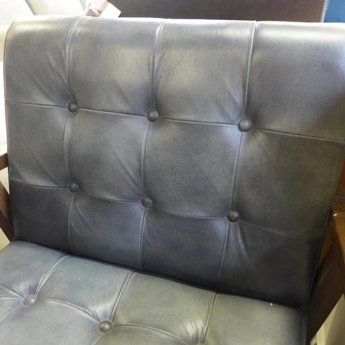 1583 - A grey leather armchair - damaged frame * this lot is subject to VAT