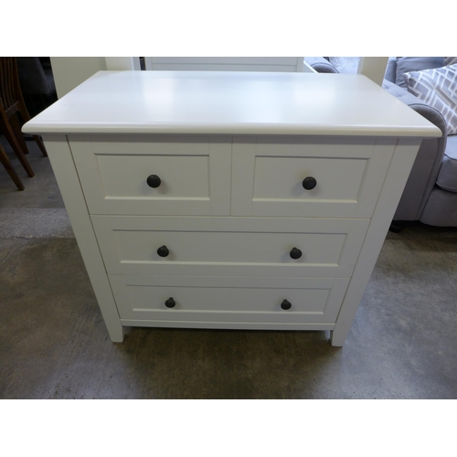 1465 - A white painted cot bed and chest of drawers * this lot is subject to VAT