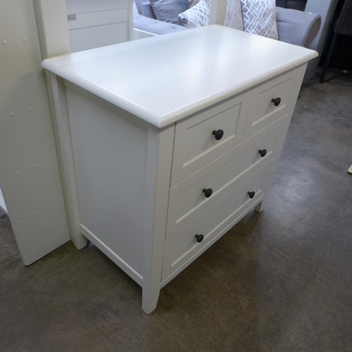 1465 - A white painted cot bed and chest of drawers * this lot is subject to VAT