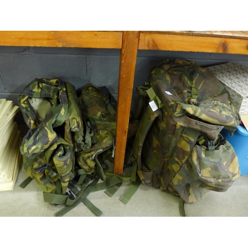 1225 - Two Northern Ireland day rucksacks, a British Army DPM Long Back Bergan with side pouches and five S... 