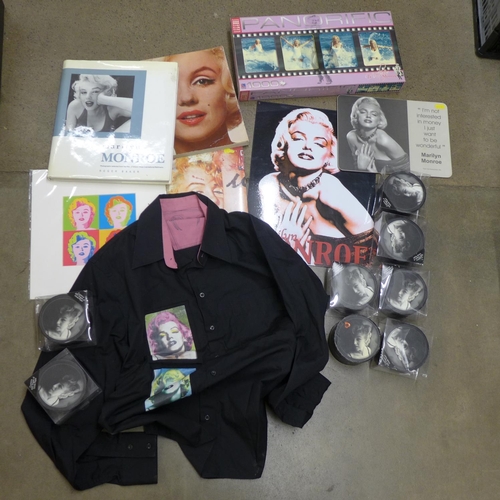 1256 - A collection of Marilyn Monroe memorabilia including two books, 2008 calendar, wall plaque, jigsaw, ... 