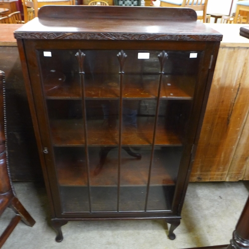 194 - An Edward VII mahogany single door bookcase