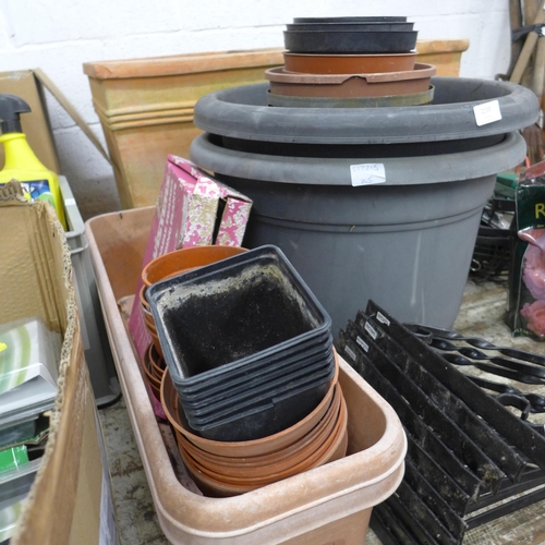 2327 - Qty of mixed size plastic plant pots and troughs