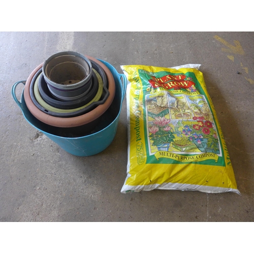 2301 - Qty. of mixed size plastic plant pots, builder's bucket & 4 x 75 ltr bags of Plant and Grow Multi-Pu... 