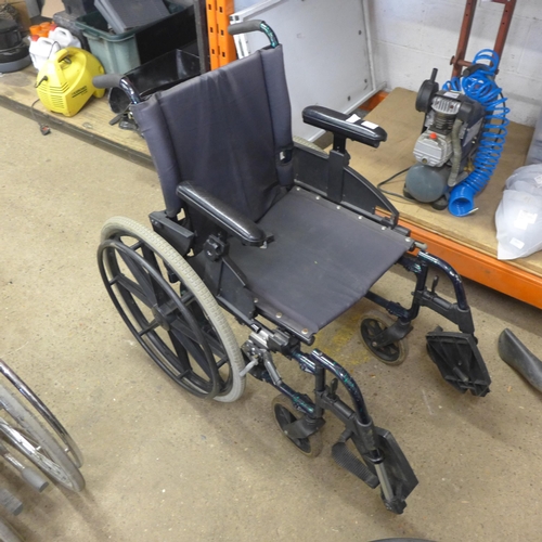 2331 - Worldwide mobility wheelchair with foot rest