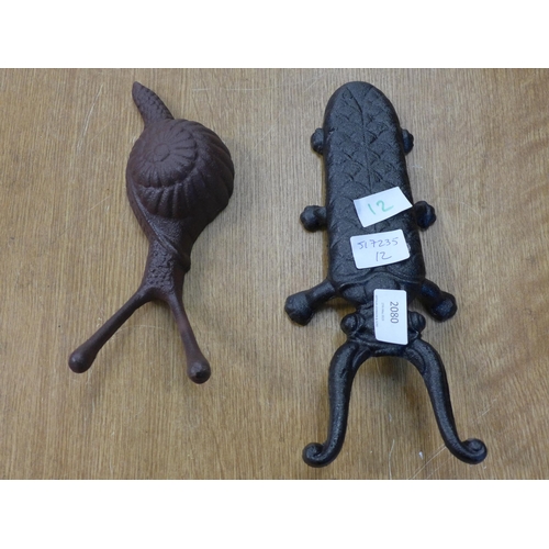 2080 - 2 Boot lifters; beetle and snail * this lot is subject to VAT