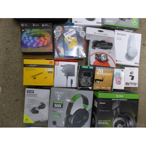 2131 - Box of assorted return items including Pokemon headphones, Xbox headsets, kids digital cameras and m... 