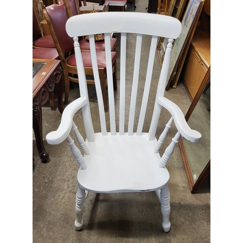 221 - A set of four beech kitchen chairs and a painted farmhouse armchair