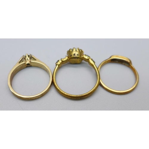 1131 - A 9ct gold and diamond ring, 2.4g, K, and two other rings, a/f