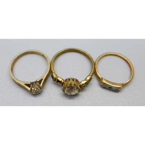 1131 - A 9ct gold and diamond ring, 2.4g, K, and two other rings, a/f