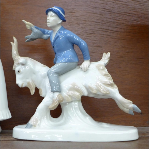 612 - Four Nao figures, a Zaphir figure and a GDR figure of a boy riding a goat