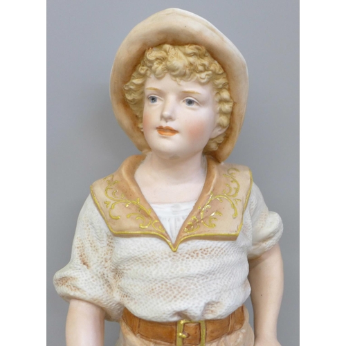 614 - A 19th Century French porcelain figure of a fisher boy, 36cm