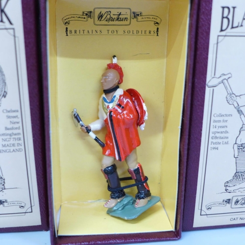 647 - Three Britains Black Hawk foot figures, boxed