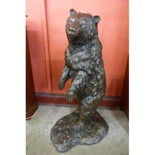 101 - A large bronze figure of a grizzly bear